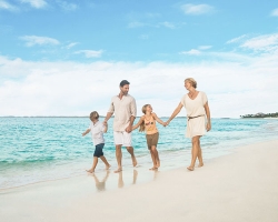 Family walking on beach