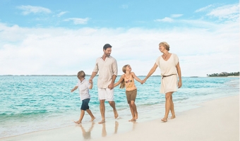 Family walking on beach